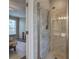 Updated bathroom with a glass-enclosed tiled shower and access to the bedroom at 4111 Mcever Woods Nw Dr, Acworth, GA 30101