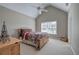 Bedroom with neutral walls and carpet, a ceiling fan and a window at 4111 Mcever Woods Nw Dr, Acworth, GA 30101