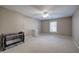 Neutral bedroom with a ceiling fan, plenty of natural light, and space for flexible use as a Bedroom at 4111 Mcever Woods Nw Dr, Acworth, GA 30101
