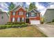 Charming two-story brick home with well-manicured landscaping at 4111 Mcever Woods Nw Dr, Acworth, GA 30101