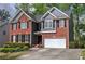 Charming two-story brick home with well-manicured landscaping at 4111 Mcever Woods Nw Dr, Acworth, GA 30101