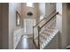 Inviting foyer with hardwood floors, staircase, and a view of the front door at 4111 Mcever Woods Nw Dr, Acworth, GA 30101