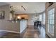 Open kitchen featuring an island, wooden cabinets, stainless appliances, and a breakfast nook at 4111 Mcever Woods Nw Dr, Acworth, GA 30101