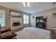 Spacious living room with a fireplace, large rug, and a modern entertainment center at 4111 Mcever Woods Nw Dr, Acworth, GA 30101