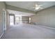 Spacious loft area featuring plush carpeting and views from the railing and windows at 4111 Mcever Woods Nw Dr, Acworth, GA 30101