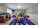 Large play room with carpet and a window at 4111 Mcever Woods Nw Dr, Acworth, GA 30101