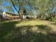 A spacious backyard with a view of the house and deck, offering ample space for relaxation at 4152 Scenic Mountain Dr, Snellville, GA 30039