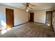 Spacious bedroom with a ceiling fan and carpet flooring at 4152 Scenic Mountain Dr, Snellville, GA 30039