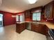 Updated kitchen with an island, stainless steel appliances, and bright lighting at 4152 Scenic Mountain Dr, Snellville, GA 30039