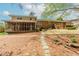 Rear exterior featuring a patio and deck, ideal for outdoor entertaining at 1152 Old Coach Rd, Stone Mountain, GA 30083