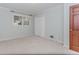 Bedroom featuring a double door closet and large window that provides natural light at 1152 Old Coach Rd, Stone Mountain, GA 30083