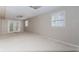 Inviting living room featuring a glass door and windows offering plenty of natural light at 1152 Old Coach Rd, Stone Mountain, GA 30083
