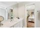 Bright bathroom with a large vanity and a clear view to the connecting bedroom at 2726 Mabry Ne Rd, Atlanta, GA 30319