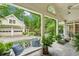 Inviting covered patio overlooking the lush garden and garage at 2726 Mabry Ne Rd, Atlanta, GA 30319