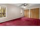Carpeted bedroom featuring natural light from two windows and a closet with ample storage space at 3450 Brookhill Cir, Marietta, GA 30062