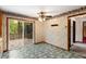 Cozy dining area with sliding glass doors leading to the deck, and bright wallpaper at 3450 Brookhill Cir, Marietta, GA 30062