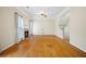 Bright living room with fireplace, hardwood floors, and tall ceilings at 5213 Pinnacle Point Ct, Norcross, GA 30071