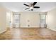 Large main bedroom area featuring hard wood floors and 2 large windows at 5213 Pinnacle Point Ct, Norcross, GA 30071