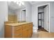 Bathroom with double sinks, granite countertop, tile floors, and a shower at 711 Cosmopolitan Ne Dr # 213, Atlanta, GA 30324