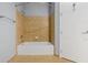 A full bathtub with tile surround at 711 Cosmopolitan Ne Dr # 213, Atlanta, GA 30324