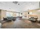 Spacious game room features a pool table and various seating areas, ideal for socializing and recreation at 711 Cosmopolitan Ne Dr # 213, Atlanta, GA 30324