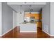 Apartment kitchen features wood cabinets, island with breakfast bar and stainless steel appliances at 711 Cosmopolitan Ne Dr # 213, Atlanta, GA 30324