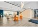 Bright building lobby features lounge seating, high ceilings and lots of natural light at 711 Cosmopolitan Ne Dr # 213, Atlanta, GA 30324