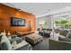 Relaxing lounge area featuring comfortable seating, a large screen TV, and a bright, airy atmosphere at 711 Cosmopolitan Ne Dr # 213, Atlanta, GA 30324