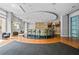 Modern lounge area with a bar, stylish seating, and contemporary lighting fixtures at 711 Cosmopolitan Ne Dr # 213, Atlanta, GA 30324