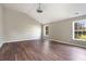 Vaulted ceiling bedroom has wood floors and sunny windows at 8908 Brandy Rose, Douglasville, GA 30134