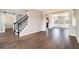 Open-concept living room and dining room with hardwood floors and ample natural light at 8908 Brandy Rose, Douglasville, GA 30134