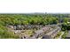 Picturesque community showcasing neighborhood townhomes, lush greenery, and scenic city skyline at 1129 Cordia Nw Ave, Atlanta, GA 30318