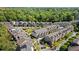 Overhead view of townhome community, showcasing rooftops, landscaping, and streets at 1129 Cordia Nw Ave, Atlanta, GA 30318