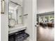 Bathroom vanity area with makeup mirror, vanity and view into main bedroom at 1129 Cordia Nw Ave, Atlanta, GA 30318