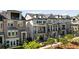 Beautiful townhomes featuring stone and brick exteriors with patios and balconies at 1129 Cordia Nw Ave, Atlanta, GA 30318