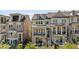 Beautiful townhomes featuring stone and brick exteriors with patios and balconies at 1129 Cordia Nw Ave, Atlanta, GA 30318