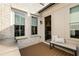 Inviting outdoor patio with brick walls, bench seating, and easy access to the home's interior at 1129 Cordia Nw Ave, Atlanta, GA 30318