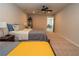 Spacious bedroom offering a ceiling fan and two comfortable beds at 1809 Park Land Ln, Snellville, GA 30078
