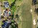 Aerial view of home featuring a private pool adjacent to a golf course at 3018 Bradshaw Club Dr, Woodstock, GA 30188