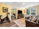 Bedroom with attached office space featuring a large window and desk at 3018 Bradshaw Club Dr, Woodstock, GA 30188