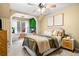 Charming bedroom with desk workspace, fish tank and beige carpet at 3018 Bradshaw Club Dr, Woodstock, GA 30188
