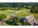 Golf driving range with golf carts at 3018 Bradshaw Club Dr, Woodstock, GA 30188