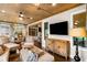 Living room with wood ceilings, hardwood floors, and comfortable seating arrangements at 3018 Bradshaw Club Dr, Woodstock, GA 30188