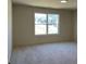 Bedroom with large window allowing plenty of sunlight into the room at 3063 Reserve Ct Sw, Conyers, GA 30094