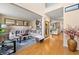 Spacious living room featuring hardwood floors and large windows providing plenty of natural light at 5147 Winding Glen Dr, Lithonia, GA 30038