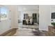 Bright office space featuring built-in cabinets, large windows, and stylish decor at 157 Longhorn Way, Auburn, GA 30102