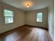 Simple bedroom with hardwood floors, offering a blank canvas to personalize at 1604 Steele Nw Dr, Atlanta, GA 30309