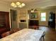 Open dining and living room view with hardwood floors, natural light, and classic wooden furniture at 1604 Steele Nw Dr, Atlanta, GA 30309