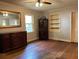 Cozy living room featuring hardwood floors, a ceiling fan, and large windows with natural light at 1604 Steele Nw Dr, Atlanta, GA 30309