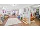 Finished basement with open play area, recessed lighting, and wood-look floors at 4554 Meadow Valley Dr, Atlanta, GA 30342